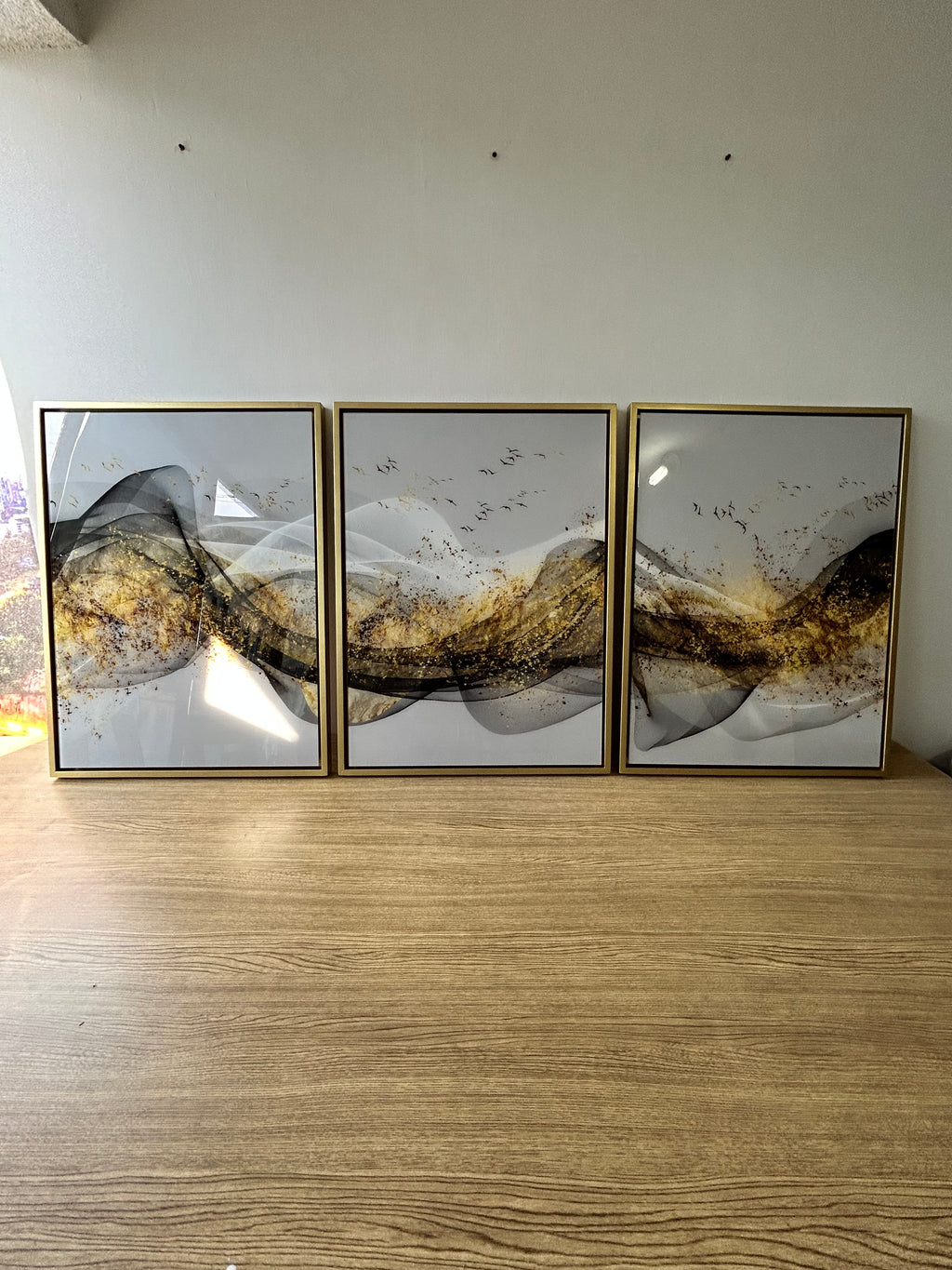 "Trilogía de Movimiento y Oro"