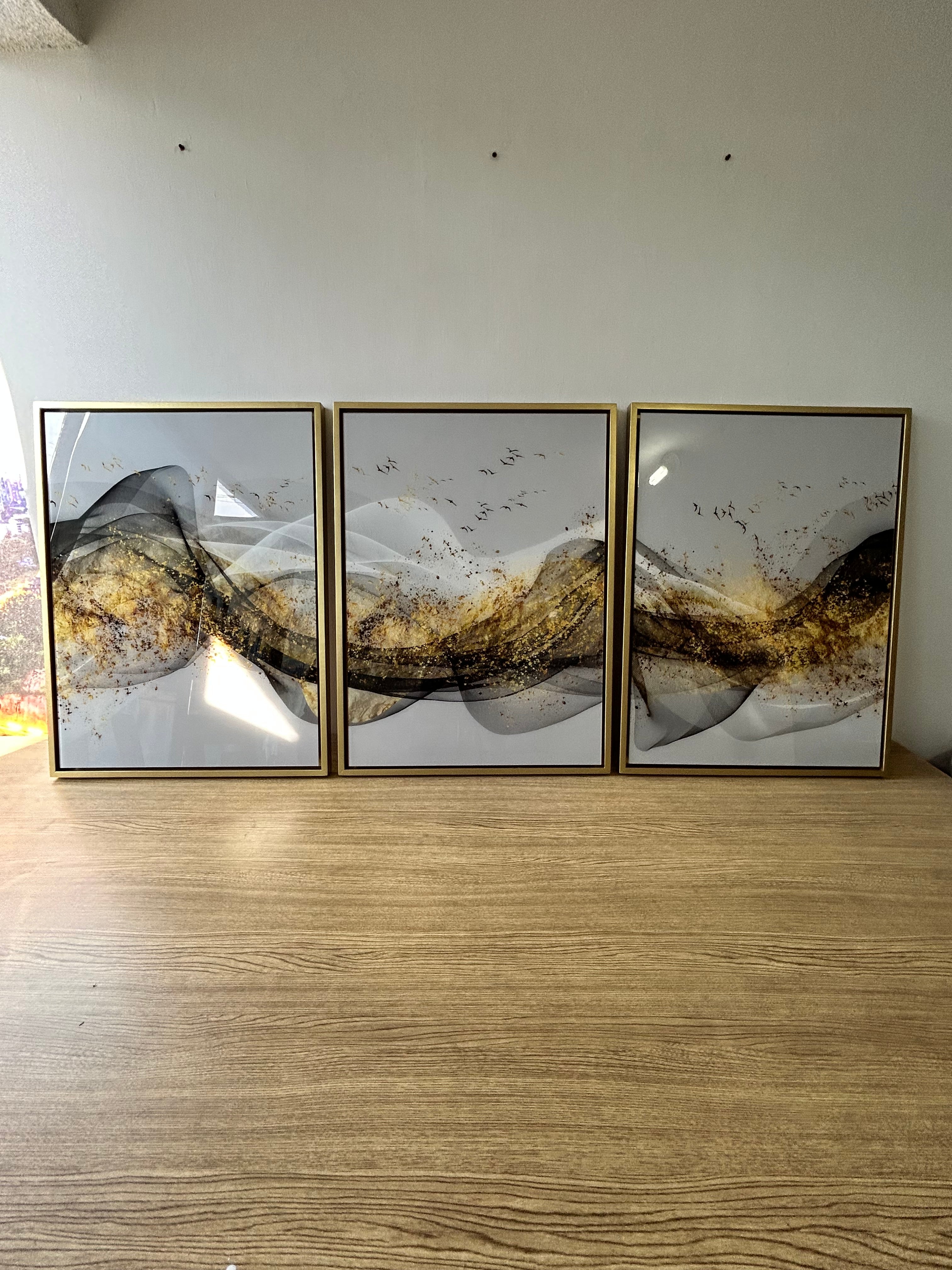 "Trilogía de Movimiento y Oro"